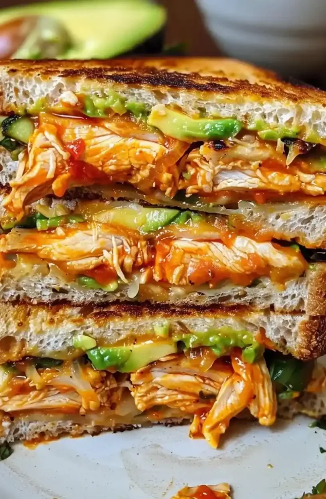 close up chicken avocado melt sandwich